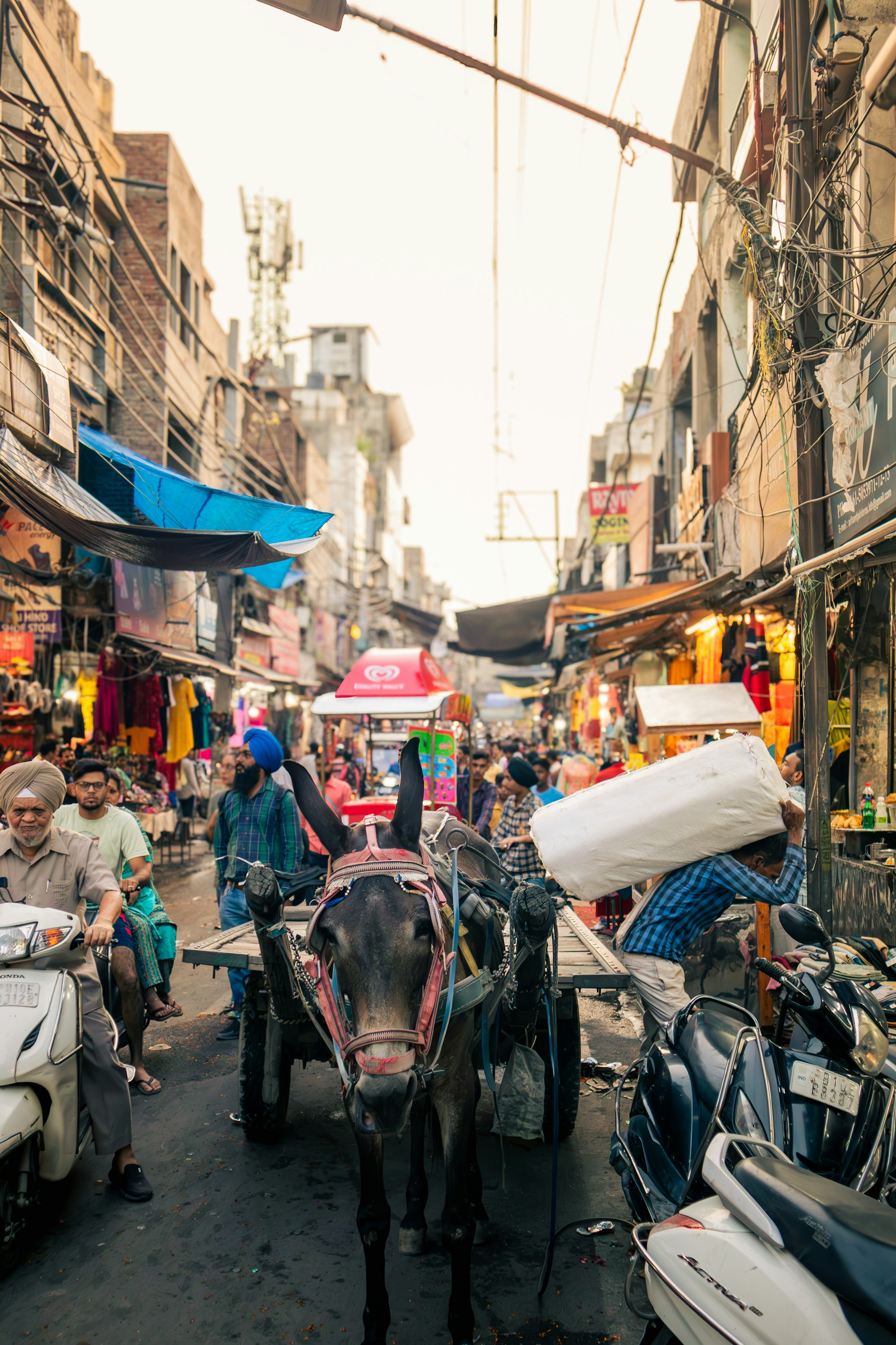 A busy Indian market street — community and commerce